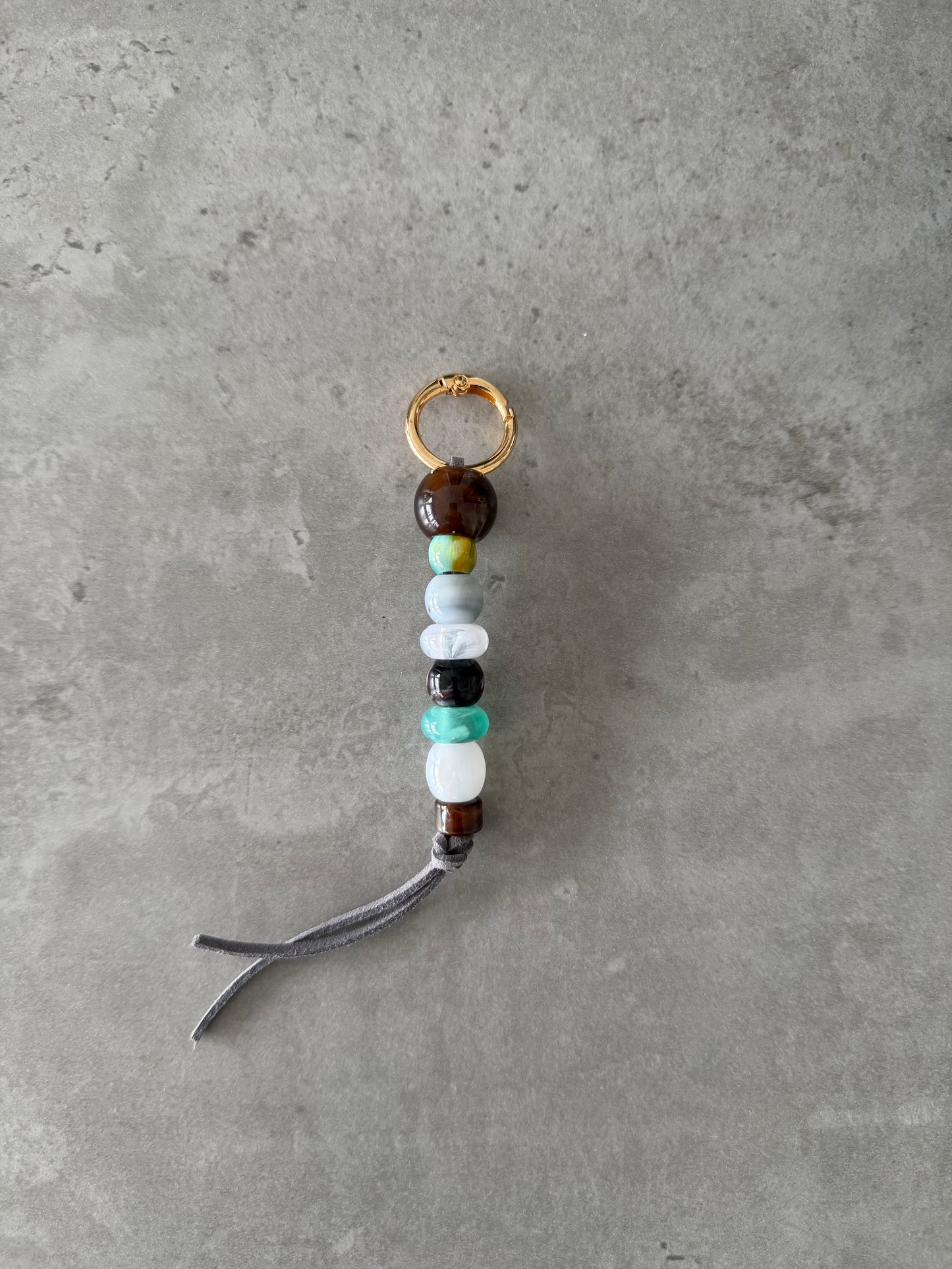 bag/key charm - mixed color grey thread