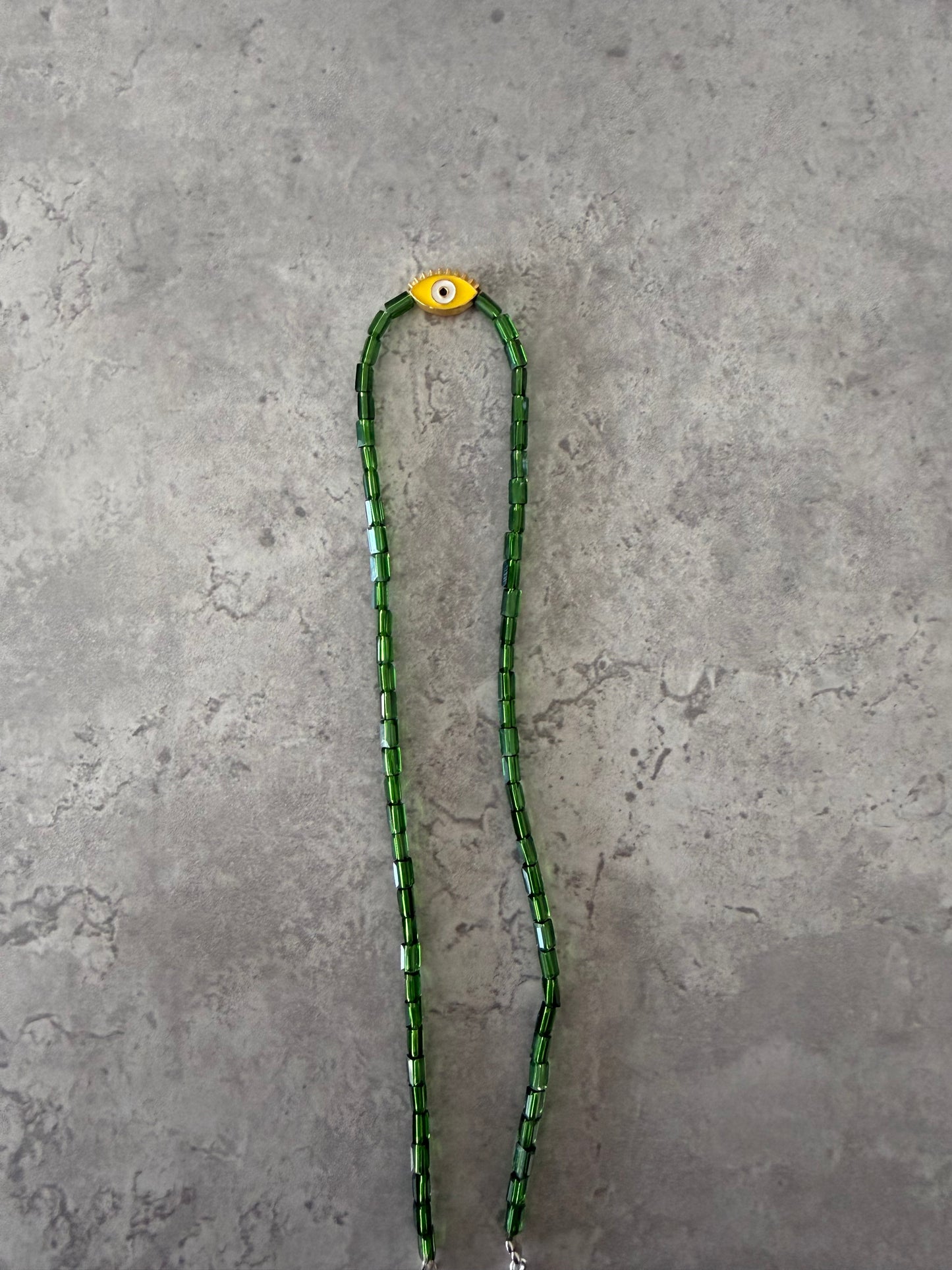 yellow eye oval necklace