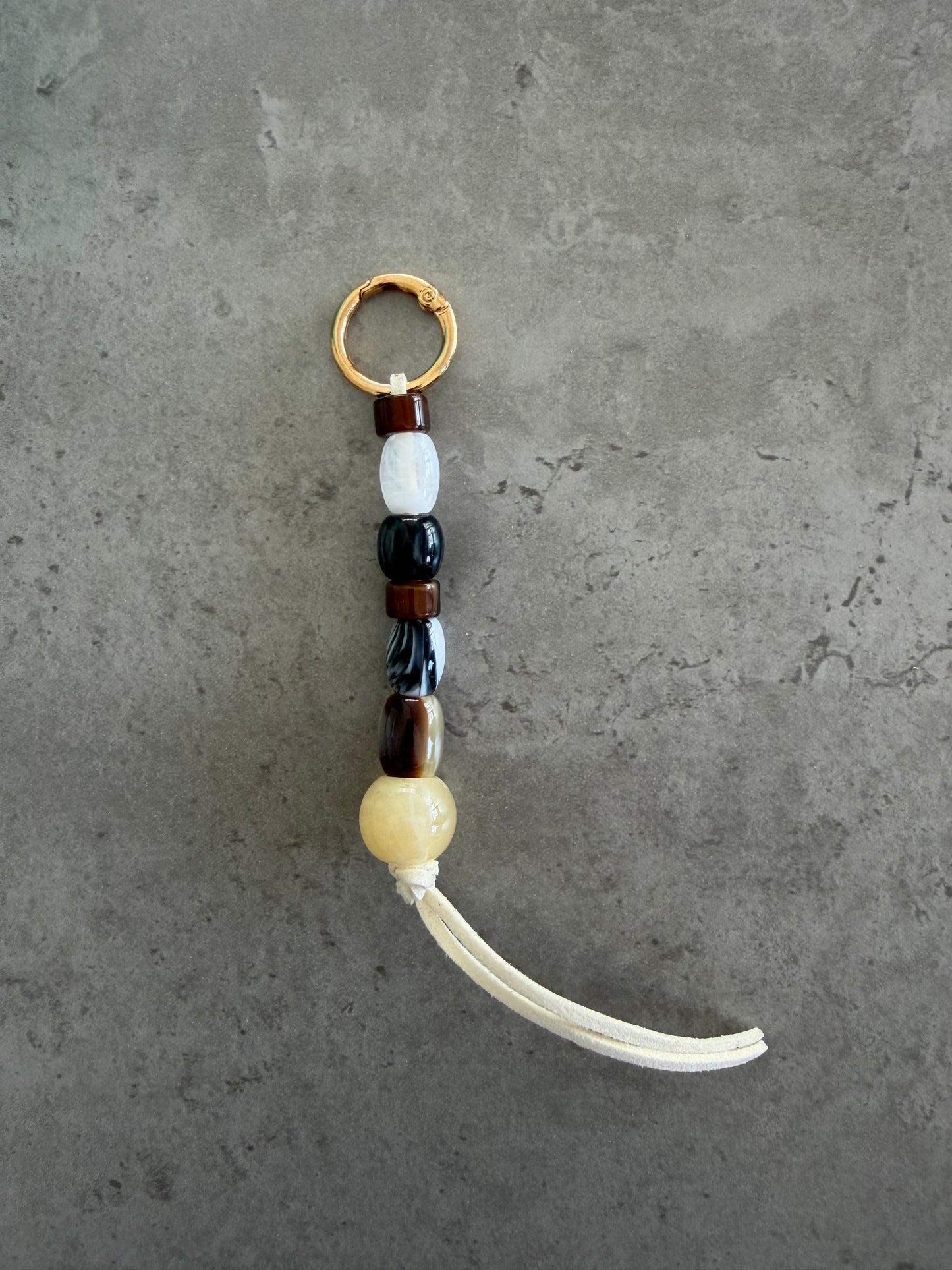 bag/key charm - brown black greys cream offwhite