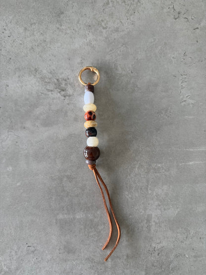 browns cream white bag/key charm