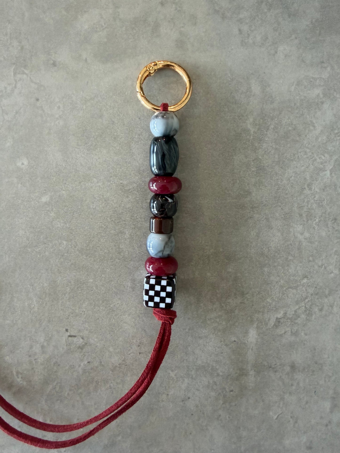 bag/key charm - maroon, greys, brown, black & white