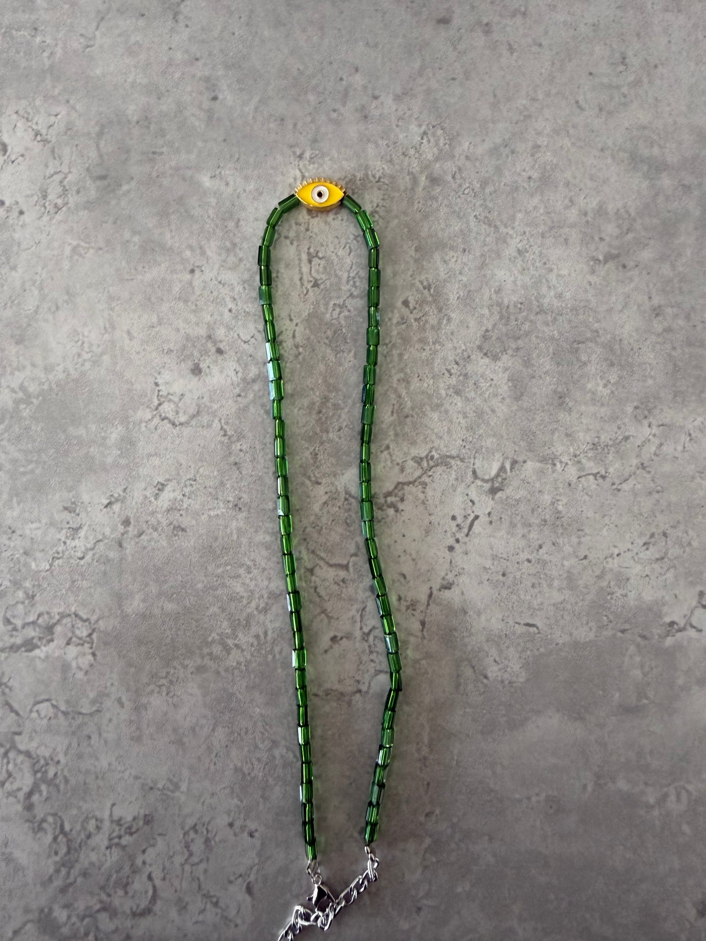 yellow eye oval necklace