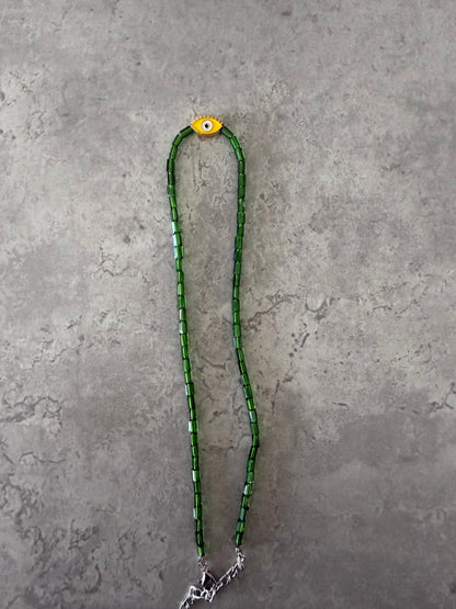 yellow eye oval necklace