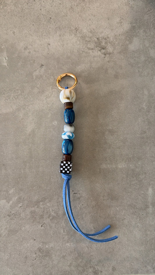 bag/key charms blues, brown, cream, black & white - blue thread