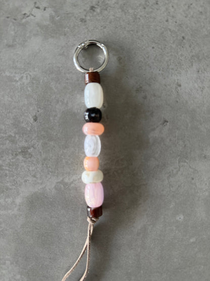 multicolor peach, pink, brown, cream bag/key charm