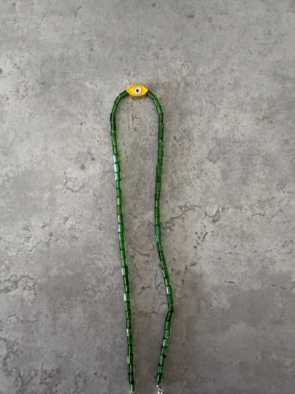 yellow eye oval necklace
