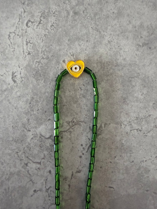 yellow eye heart necklace