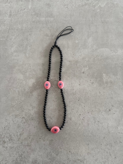 black with pink oval eyes short phonestrap