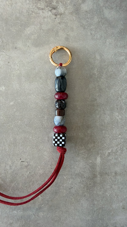 bag/key charm - maroon, greys, brown, black & white