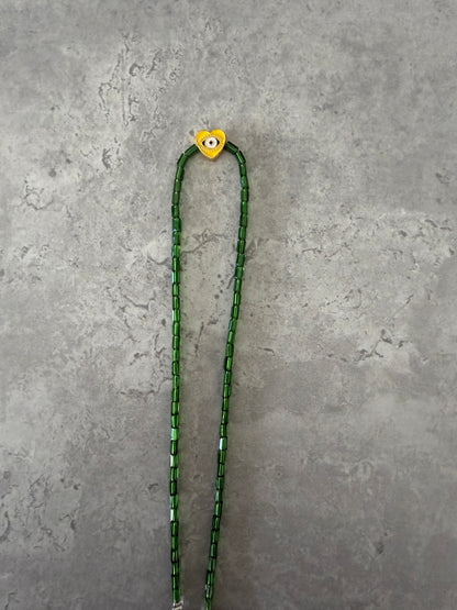 yellow eye heart necklace