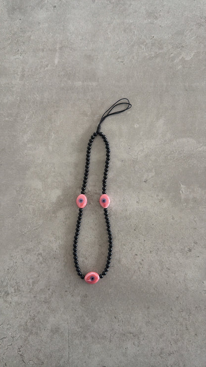 black with pink oval eyes short phonestrap