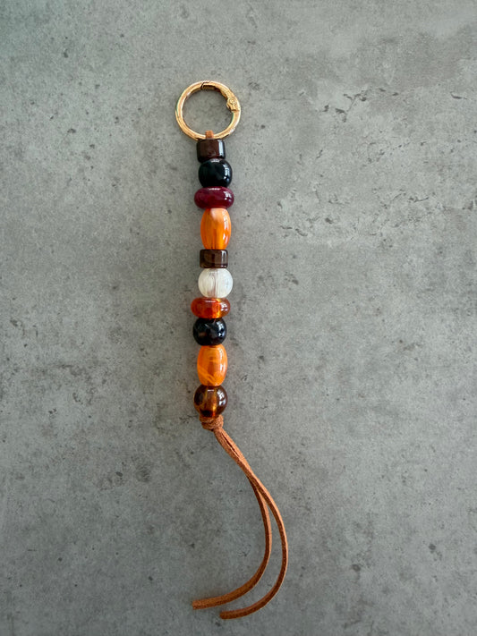 bag/key charm - oranges terracota browns maroon clear