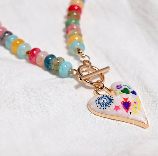 blue round eye pink star necklace