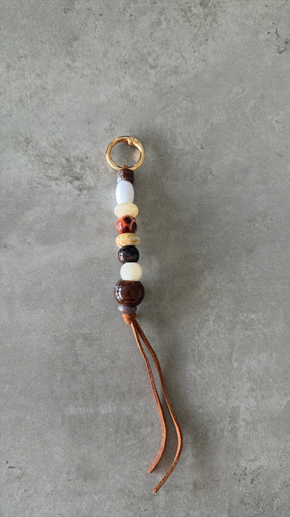 browns cream white bag/key charm