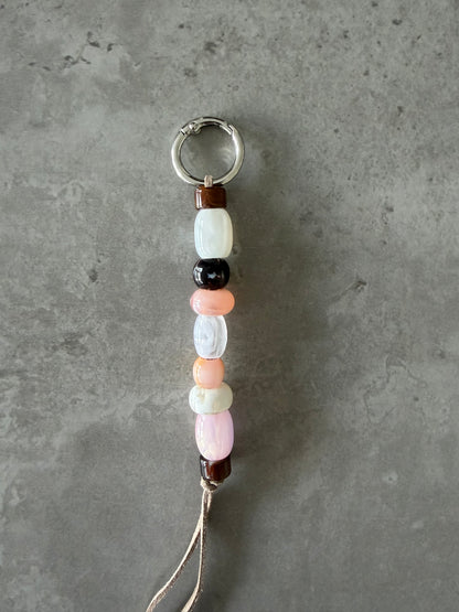 multicolor peach, pink, brown, cream bag/key charm