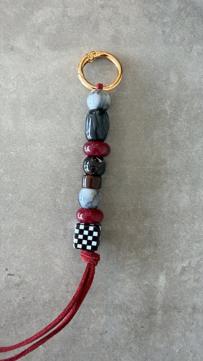 bag/key charm - maroon, greys, brown, black & white