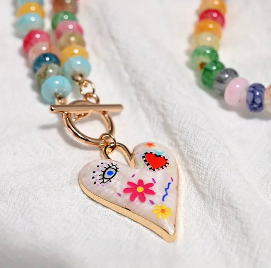 blue eye pink flower necklace